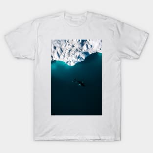 Aerial of a lone Humpback whale in front of an iceberg in Greenland T-Shirt